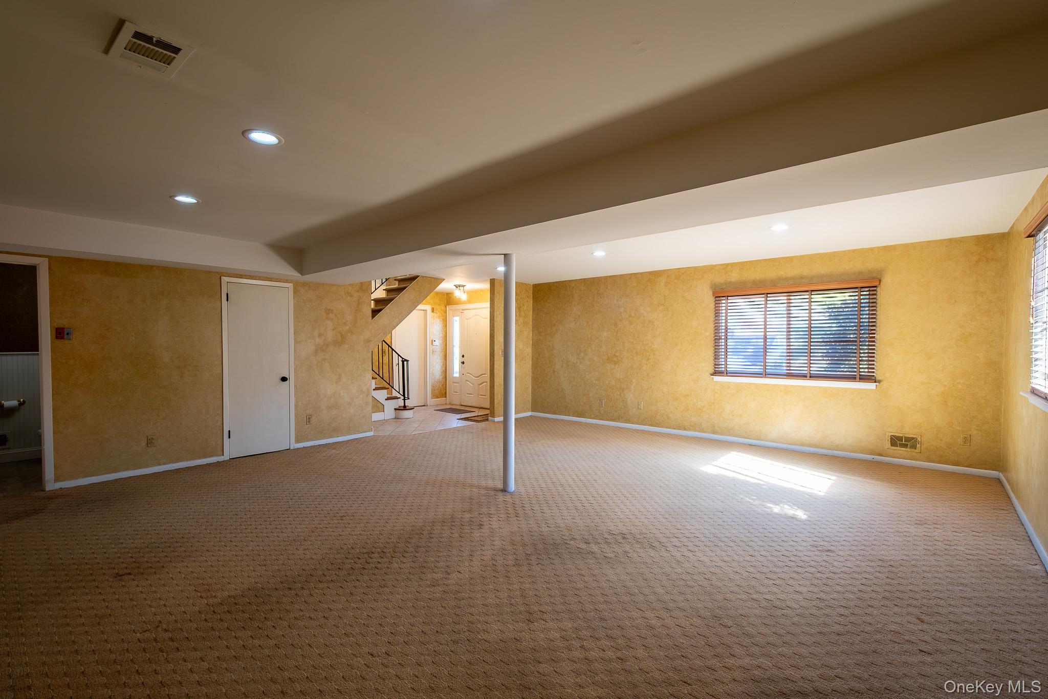83 Edgepark Road White Plains, NY 10603 - Photo 12 of 25 a view of an empty room with a window
