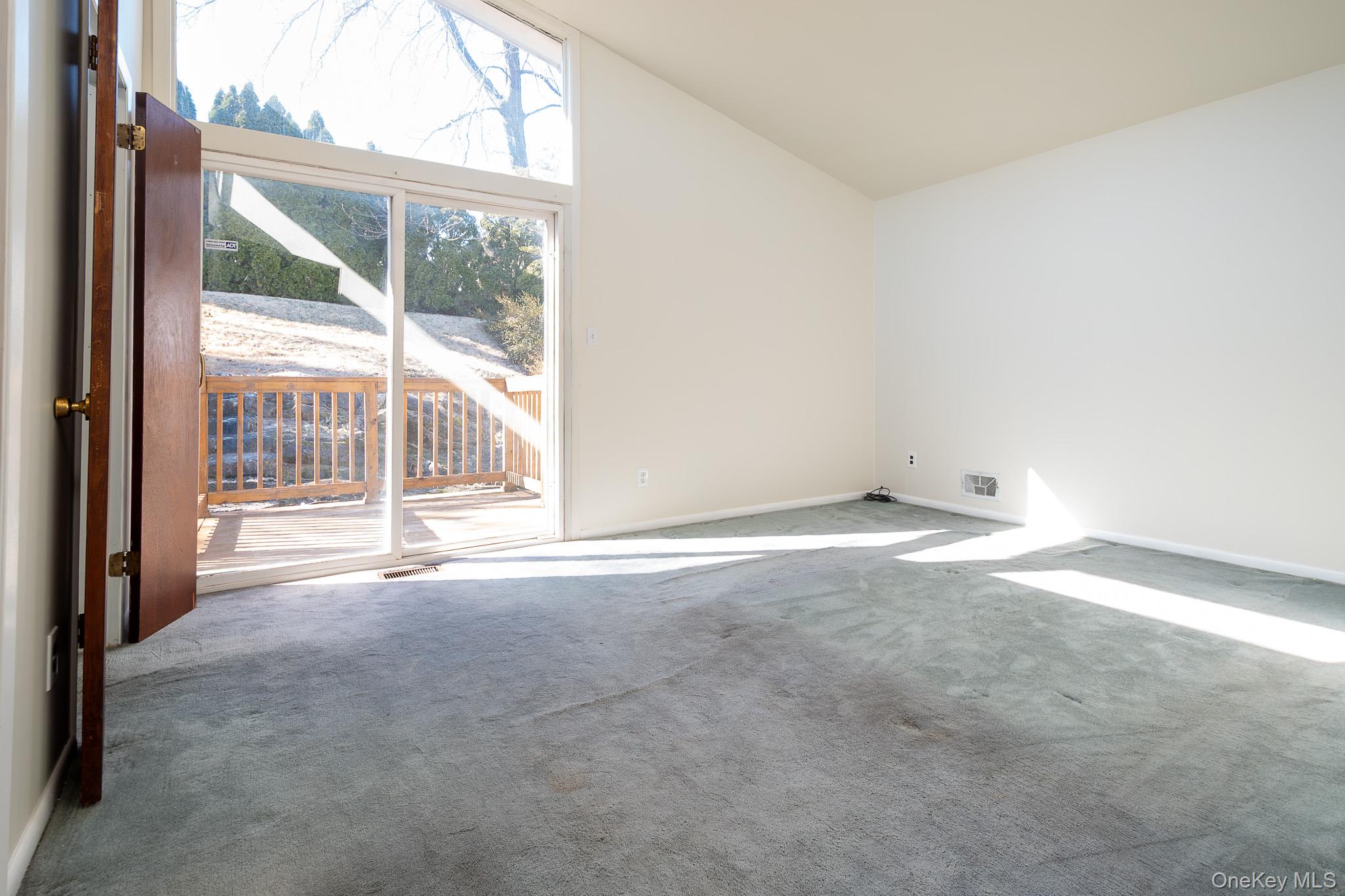 83 Edgepark Road White Plains, NY 10603 - Photo 15 of 25 a view of an empty room with a window