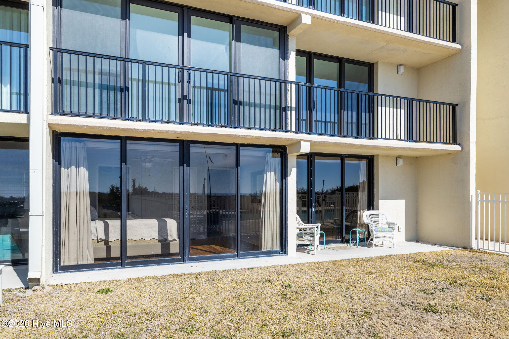 2305 West Fort Macon Road, Unit 107 Atlantic Beach, NC 28512 - Photo 2 of 32 Master & Living Room Patios