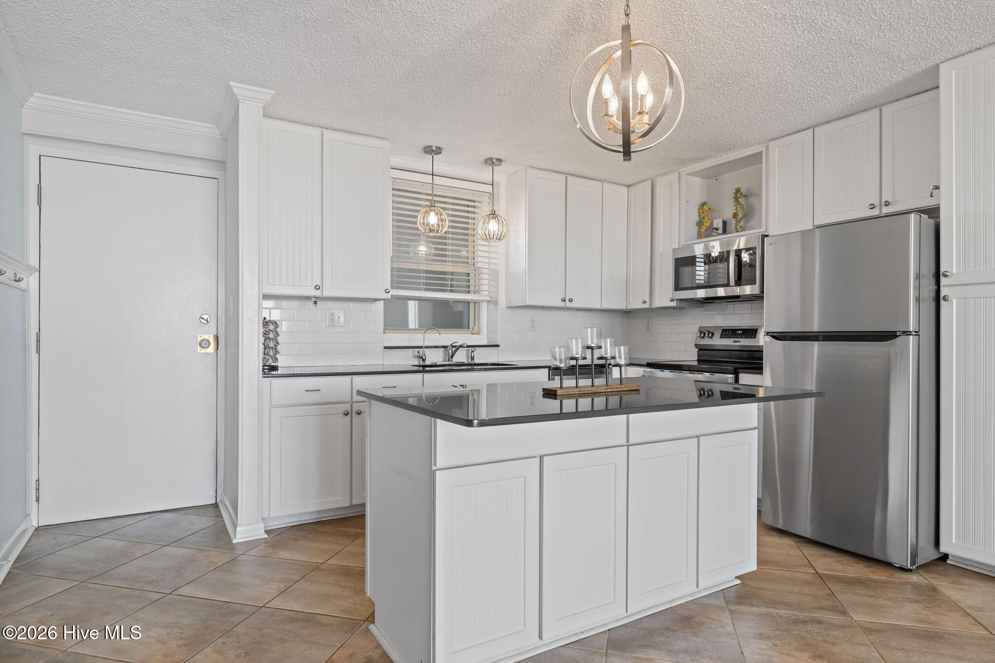 2305 West Fort Macon Road, Unit 107 Atlantic Beach, NC 28512 - Photo 9 of 32 Entrance