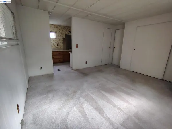an empty room with closet