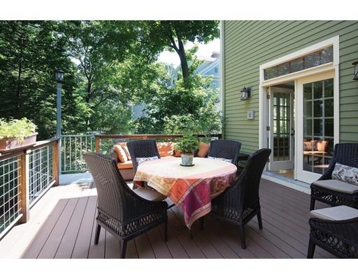 255 Clinton Road Brookline, MA 02445 - Photo 12 of 13 a outdoor dining space with furniture and wooden floor