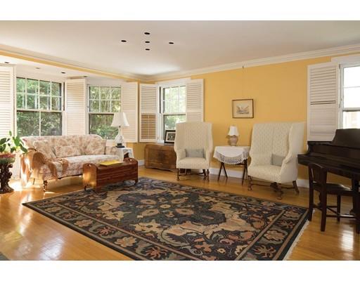 255 Clinton Road Brookline, MA 02445 - Photo 4 of 13 a living room with furniture rug and window