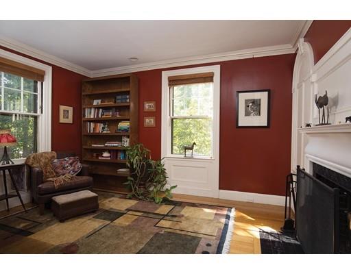 255 Clinton Road Brookline, MA 02445 - Photo 5 of 13 a living room with furniture and a potted plant
