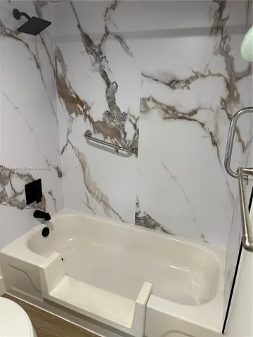 a bathroom with a bathtub