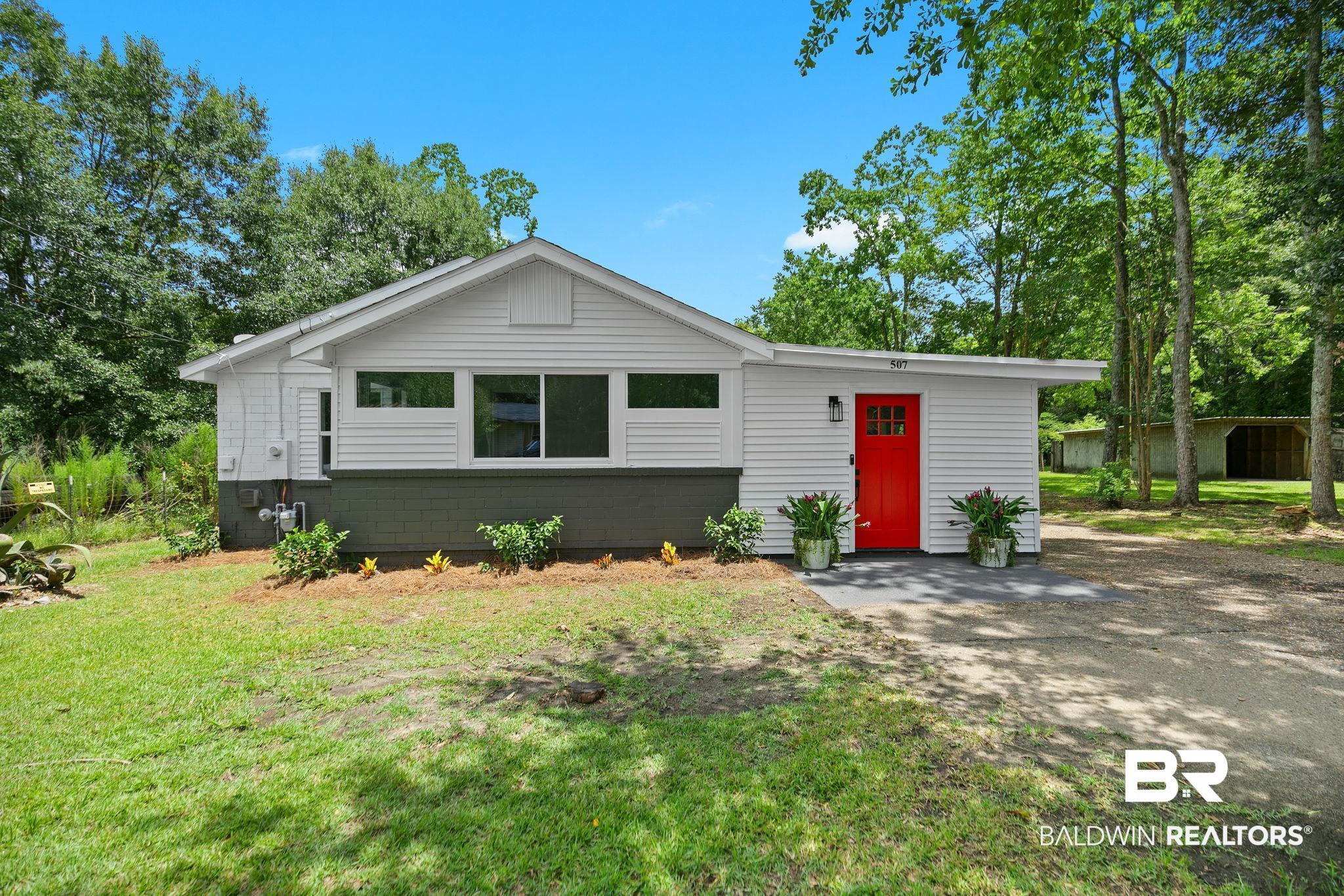 507 Byrne Street Bay Minette, AL 36507 - Photo 1 of 40 Single story home with a front lawn