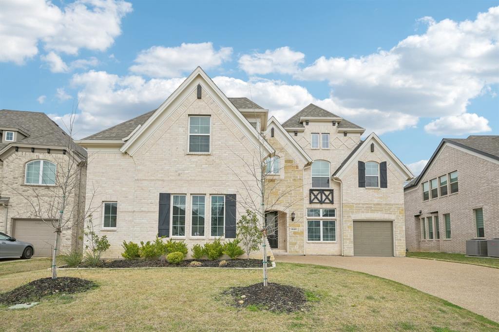 1640 Ranch House Road Celina, TX 75009 - Photo 3 of 40 a front view of a house with a garden