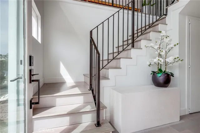 a spacious bedroom with a bed and a couch