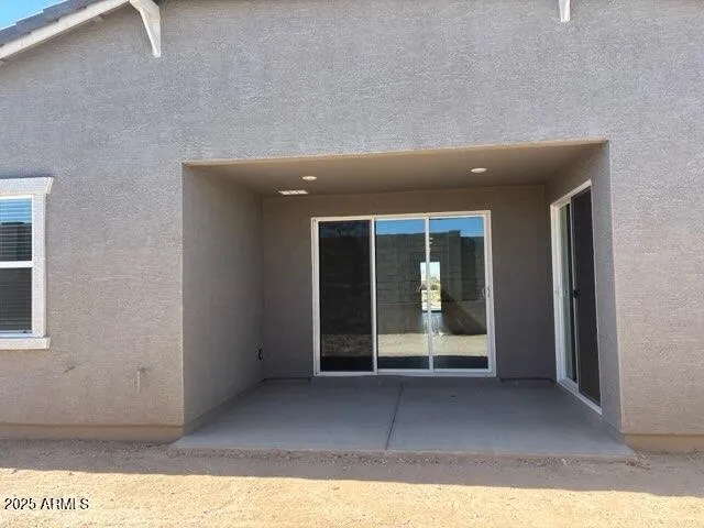 a view of a backyard of the house