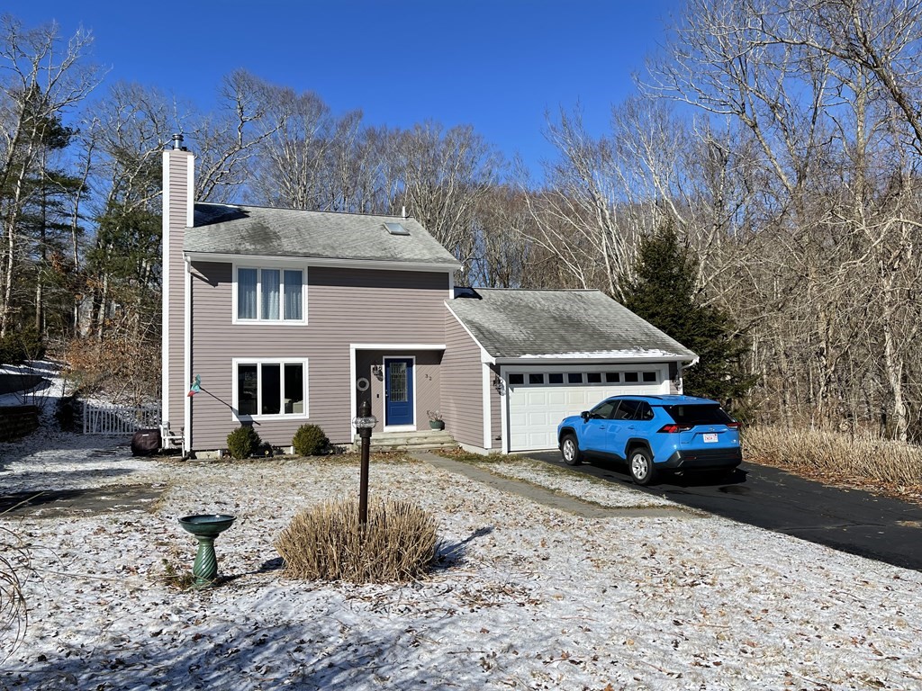 32 Birch Way Mashpee, MA 02649 - Photo 1 of 31 a car parked in front of a house