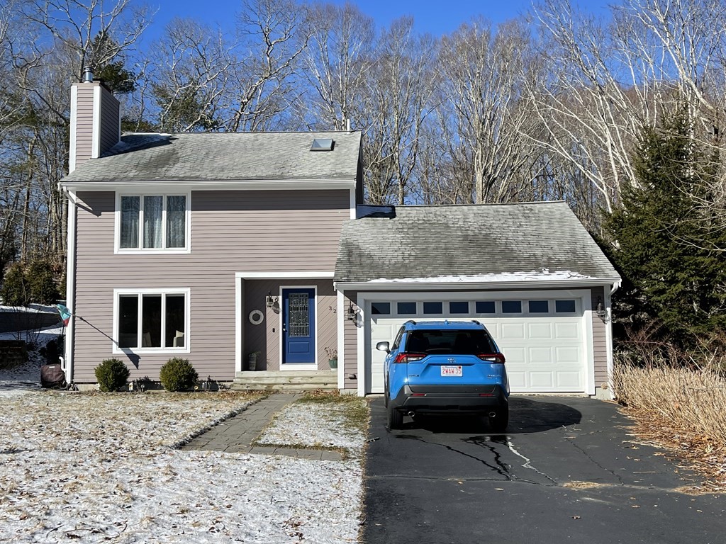 32 Birch Way Mashpee, MA 02649 - Photo 2 of 31 a car parked in front of a house