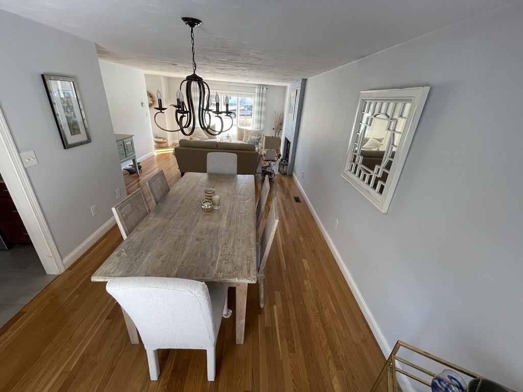 32 Birch Way Mashpee, MA 02649 - Photo 5 of 31 a view of a dining room with furniture and wooden floor