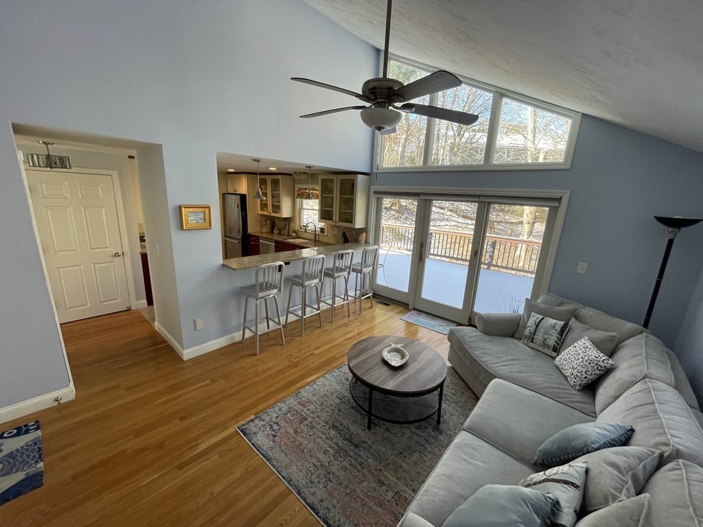 32 Birch Way Mashpee, MA 02649 - Photo 10 of 31 a living room with furniture and a flat screen tv