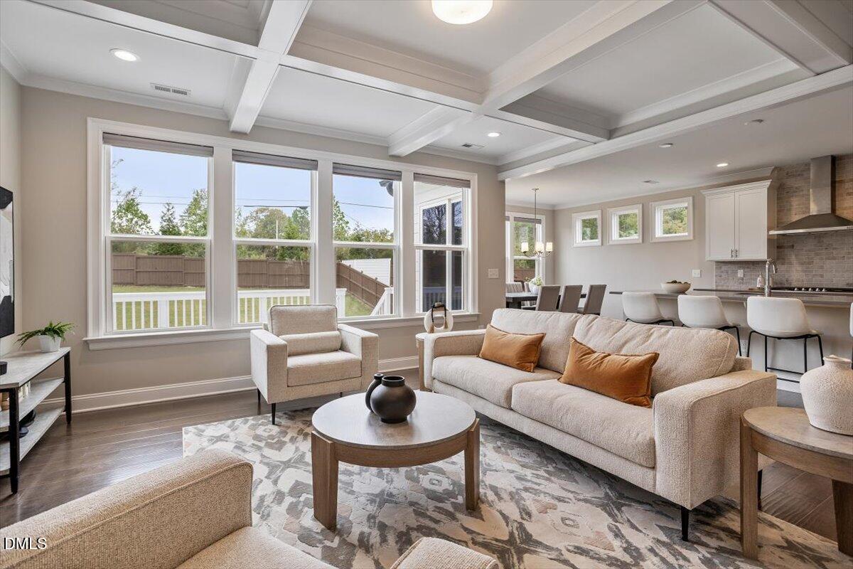 2844 Spring Shade Road Apex, NC 27523 - Photo 12 of 48 a living room with furniture and a large window
