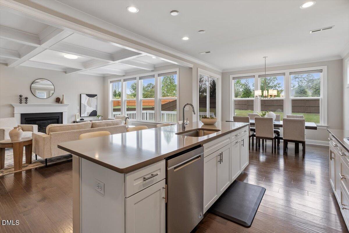 2844 Spring Shade Road Apex, NC 27523 - Photo 17 of 48 a kitchen with center island and a large window