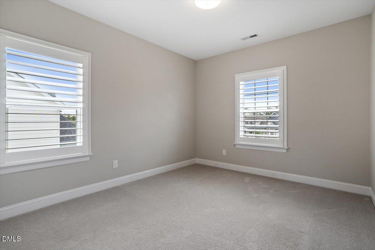 2844 Spring Shade Road Apex, NC 27523 - Photo 34 of 48 an empty room with a window
