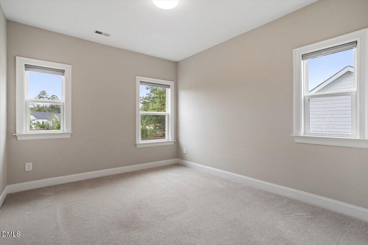 2844 Spring Shade Road Apex, NC 27523 - Photo 36 of 48 a view of an empty room with a window