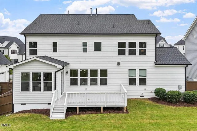 a house view with a garden space