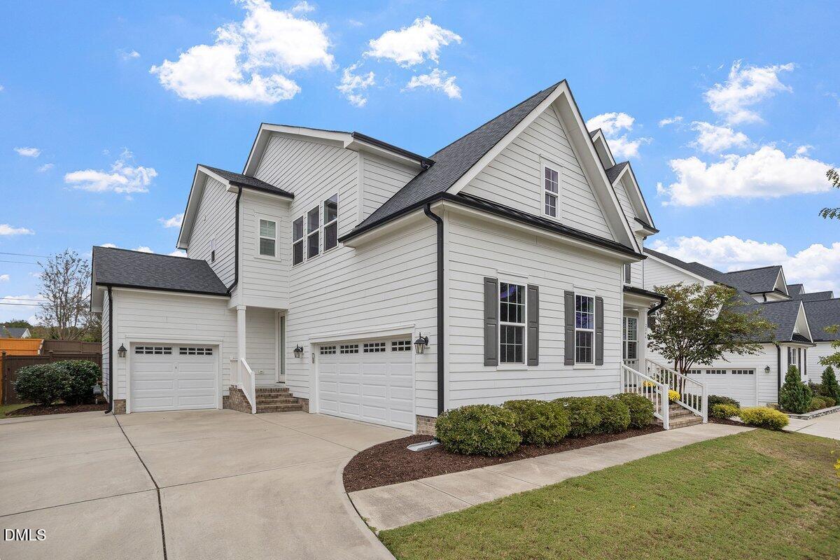 2844 Spring Shade Road Apex, NC 27523 - Photo 4 of 48 a view of a house with a yard