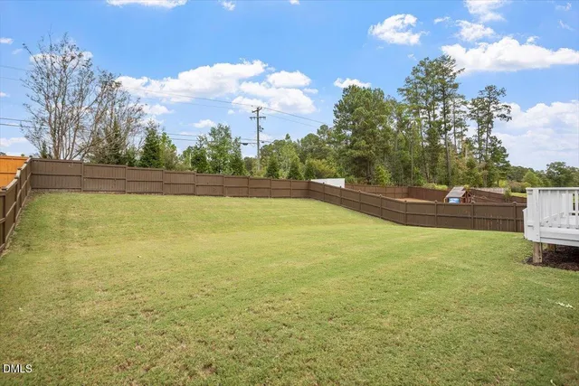 a view of a swimming pool and an outdoor space