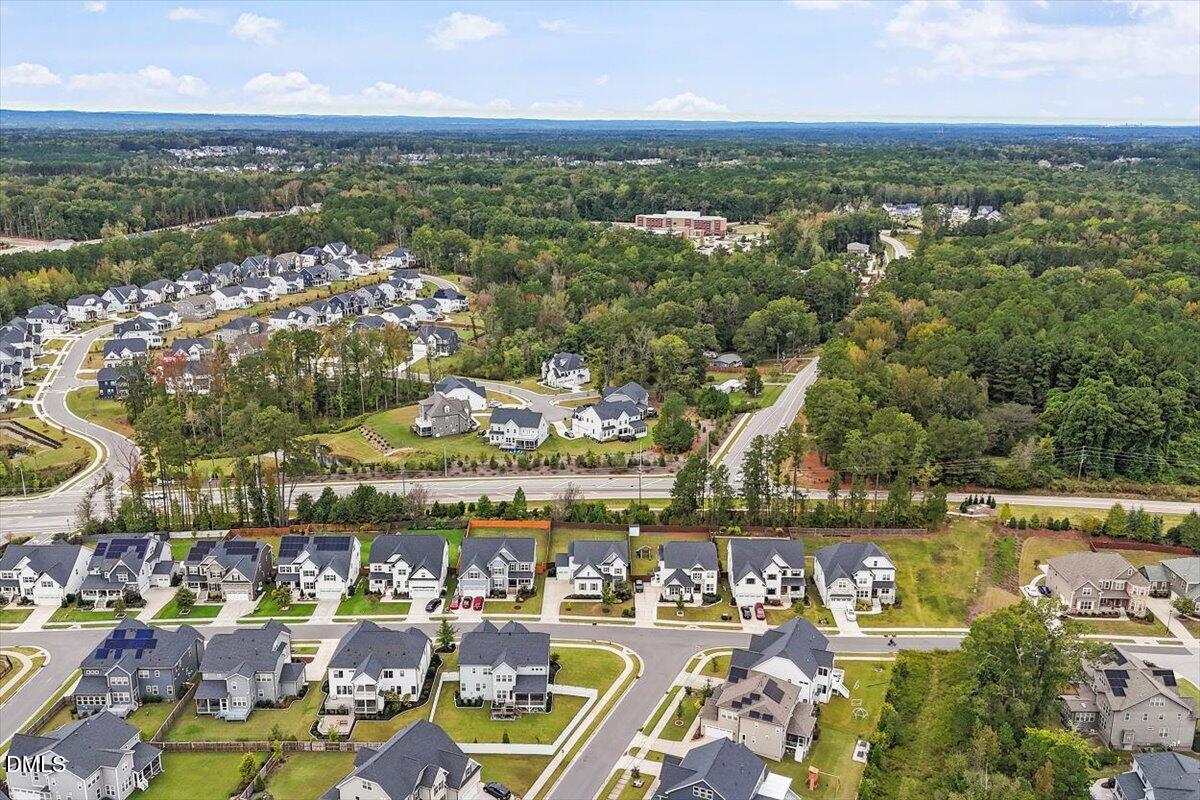 2844 Spring Shade Road Apex, NC 27523 - Photo 46 of 48 an aerial view of residential building and lake