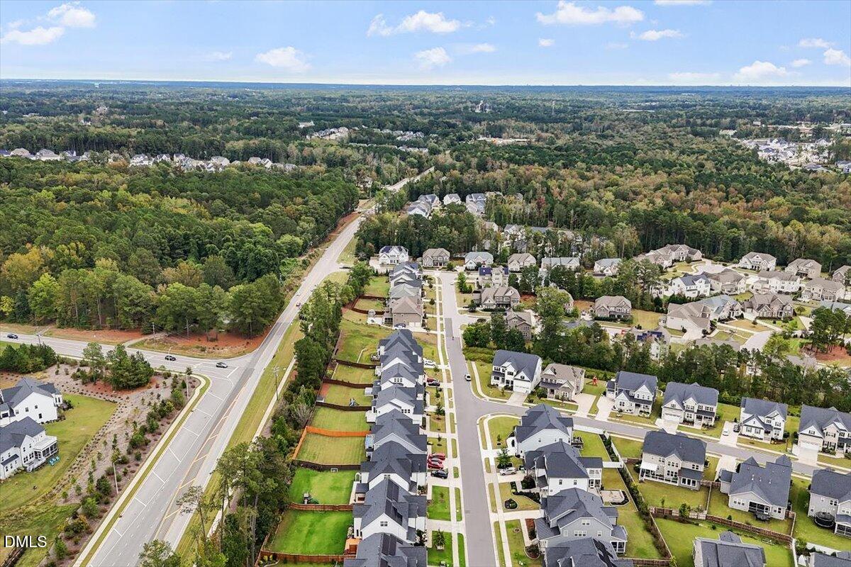 2844 Spring Shade Road Apex, NC 27523 - Photo 48 of 48 an aerial view of residential building and car parked