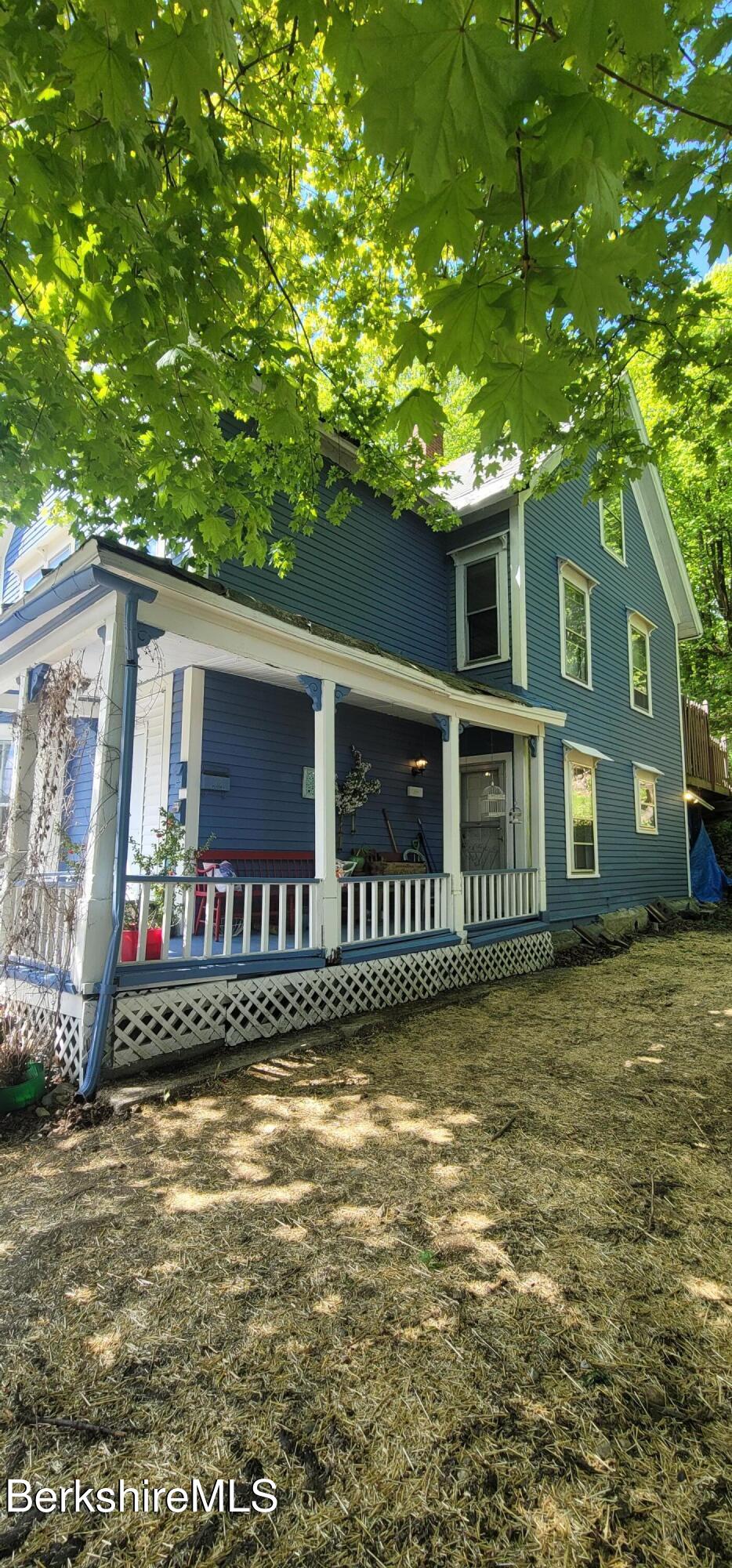 301 Walnut Street North Adams, MA 01247 - Photo 11 of 12 a front view of a house with a yard