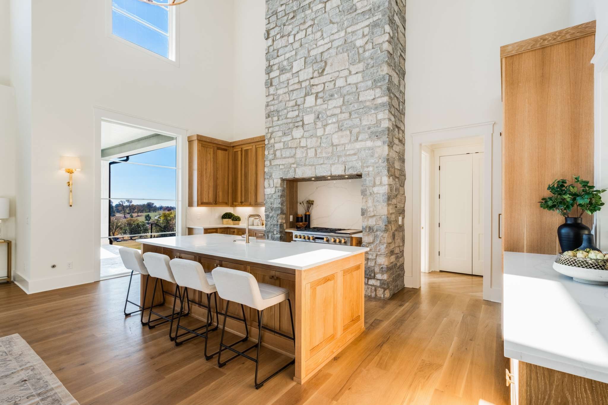 4660 Reed Road Thompson's Station, TN 37179 - Photo 15 of 69 a view of a kitchen with furniture and wooden floor