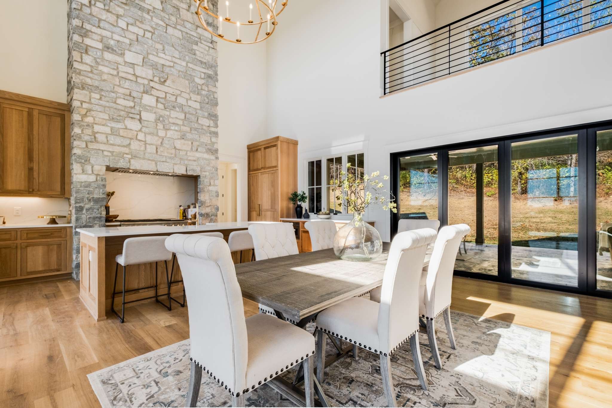 4660 Reed Road Thompson's Station, TN 37179 - Photo 23 of 69 a dining room with furniture and wooden floor