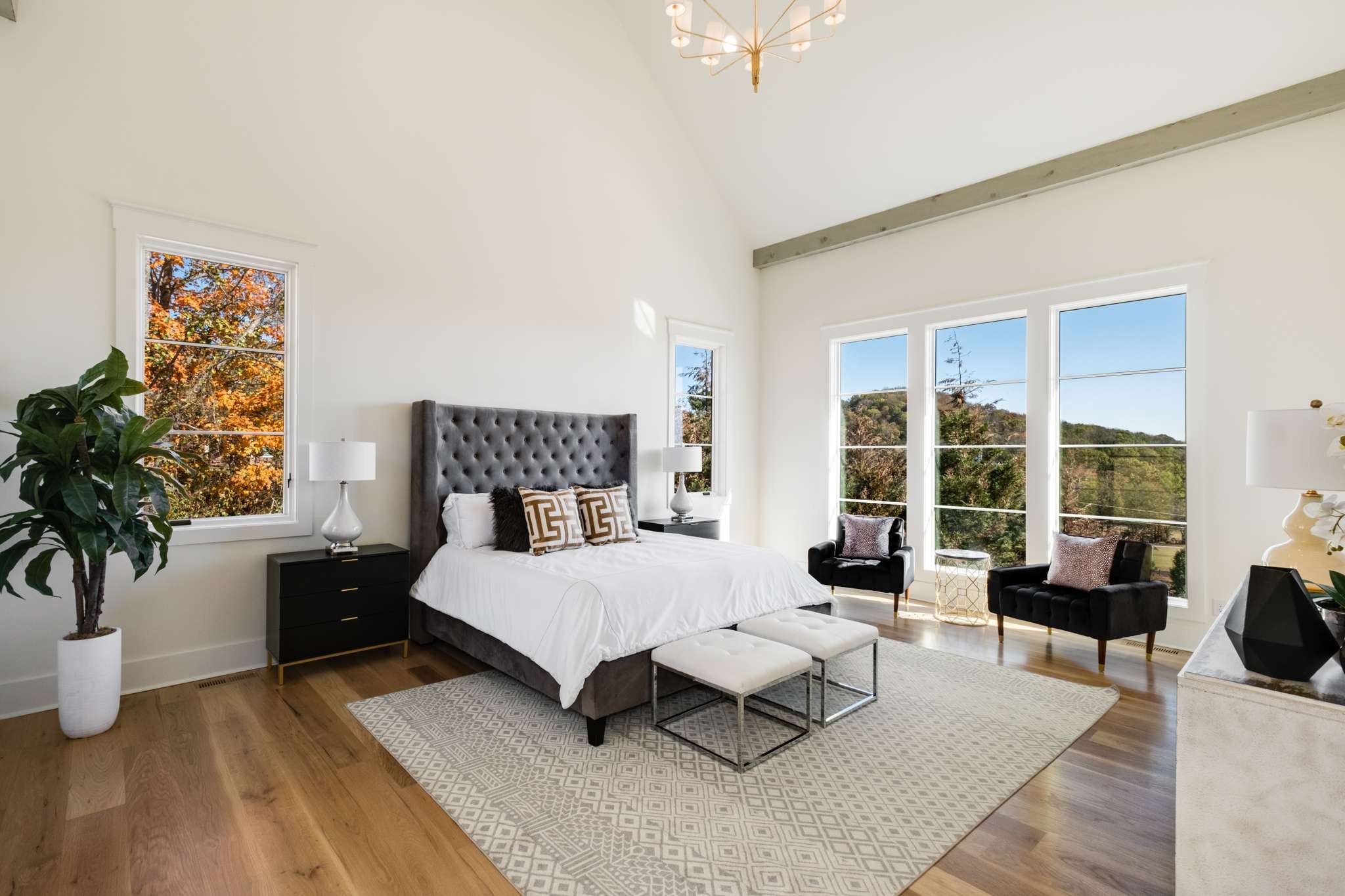 4660 Reed Road Thompson's Station, TN 37179 - Photo 28 of 69 a bedroom with a bed a table and chair