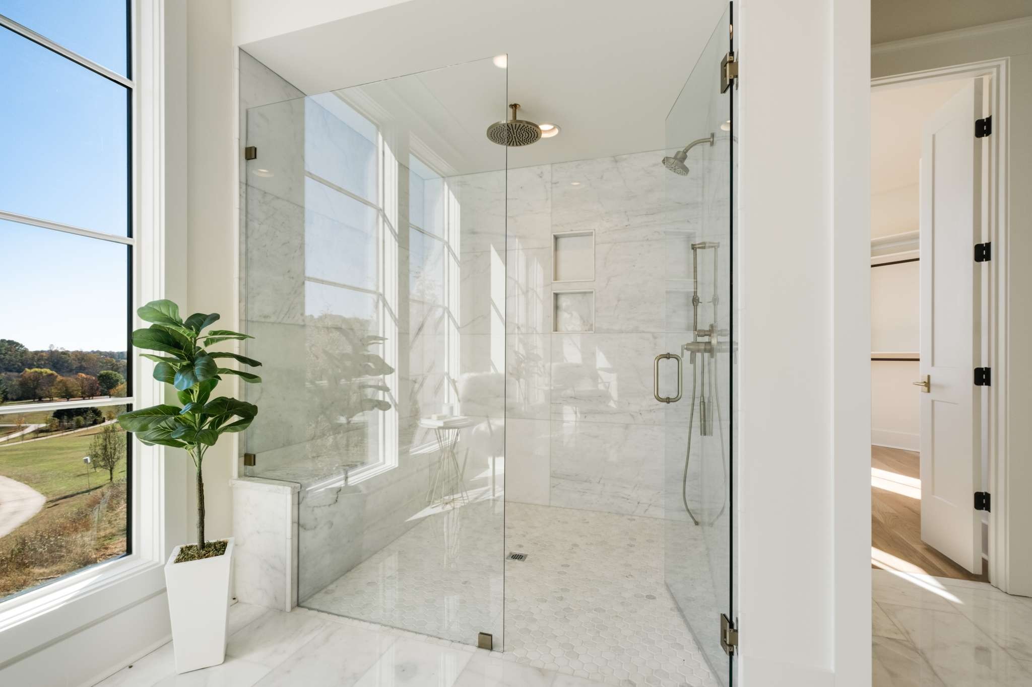 4660 Reed Road Thompson's Station, TN 37179 - Photo 32 of 69 a bathroom with a shower and a tub