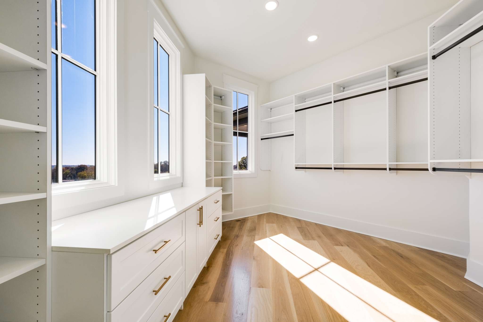 4660 Reed Road Thompson's Station, TN 37179 - Photo 34 of 69 a bathroom with a granite countertop sink mirror and a bathtub