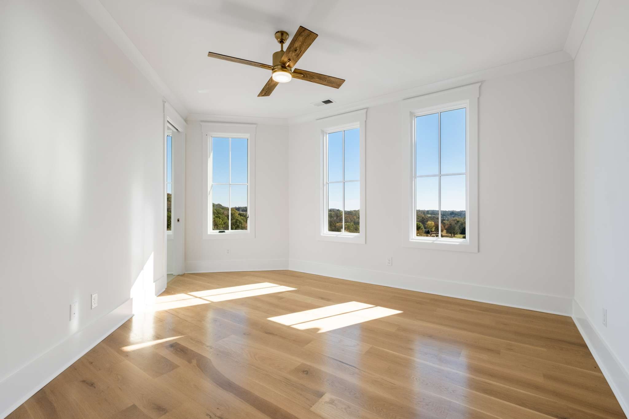 4660 Reed Road Thompson's Station, TN 37179 - Photo 41 of 69 a view of a big room with wooden floor and windows