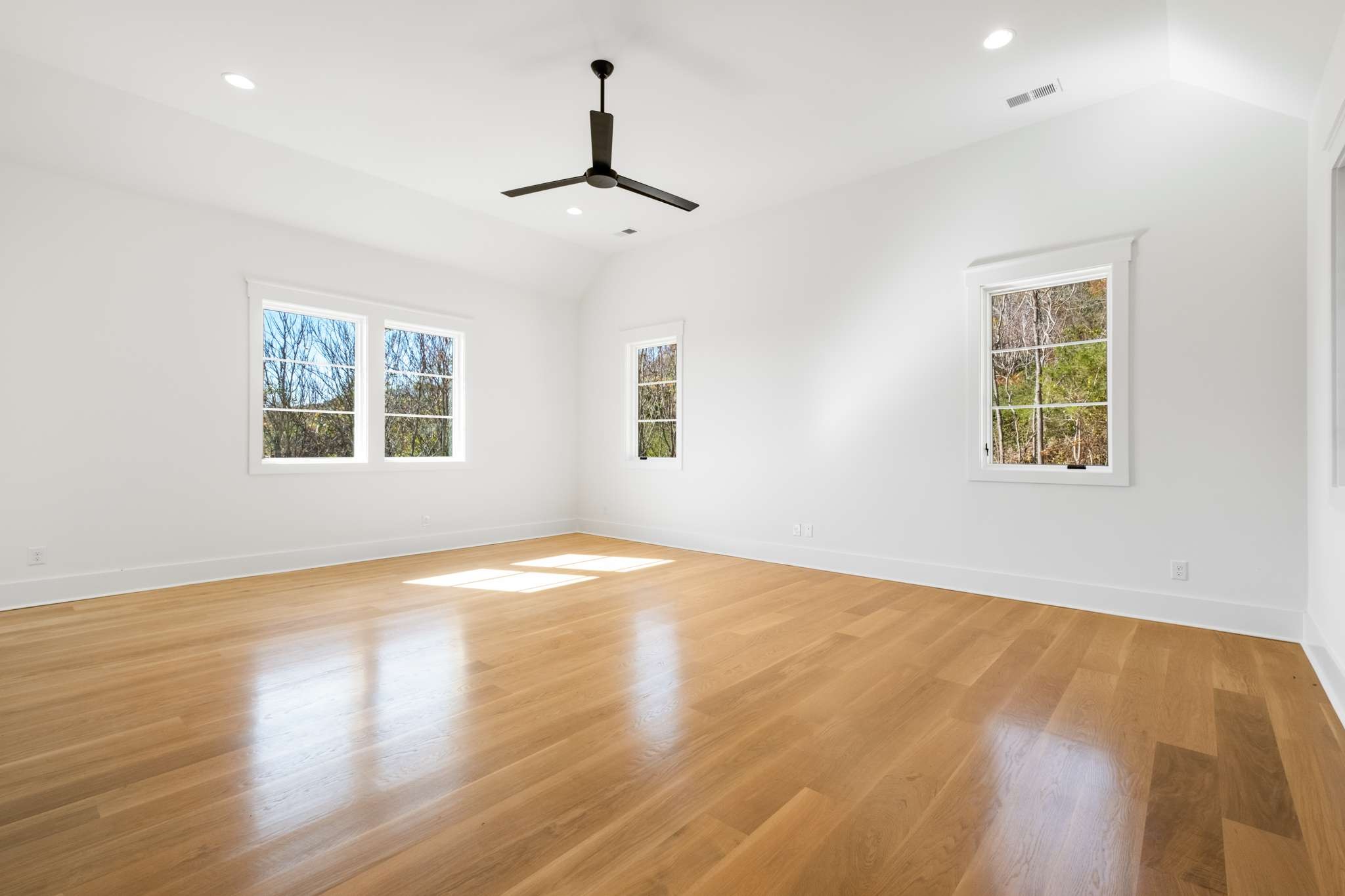 4660 Reed Road Thompson's Station, TN 37179 - Photo 43 of 69 a view of empty room with wooden floor and fan