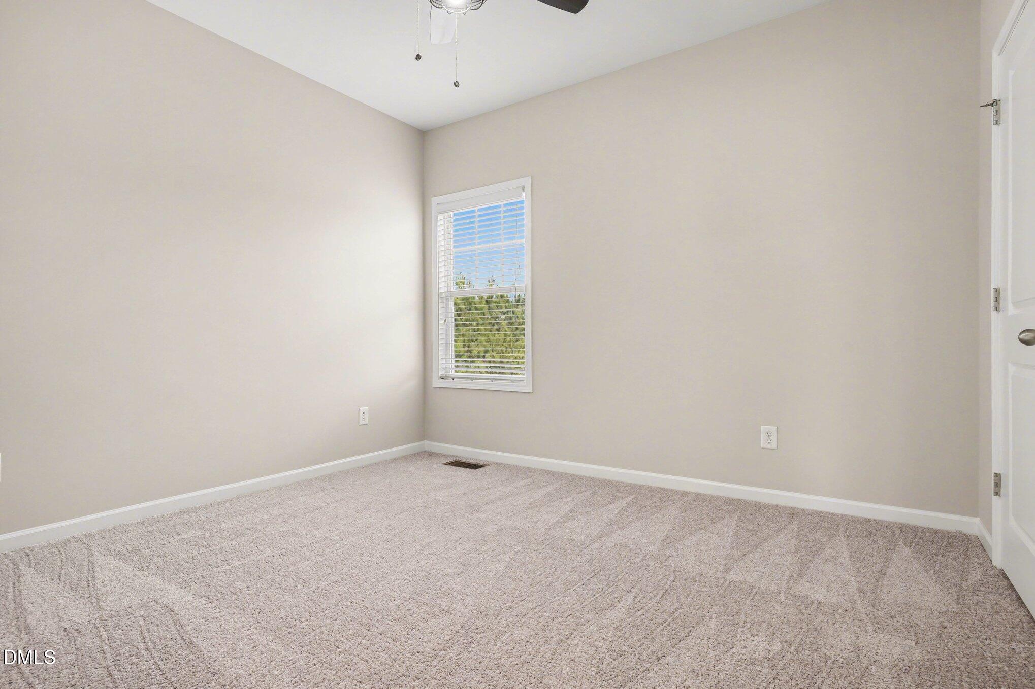 4245 Lofty Ridge Place Morrisville, NC 27560 - Photo 23 of 31 an empty room with a window