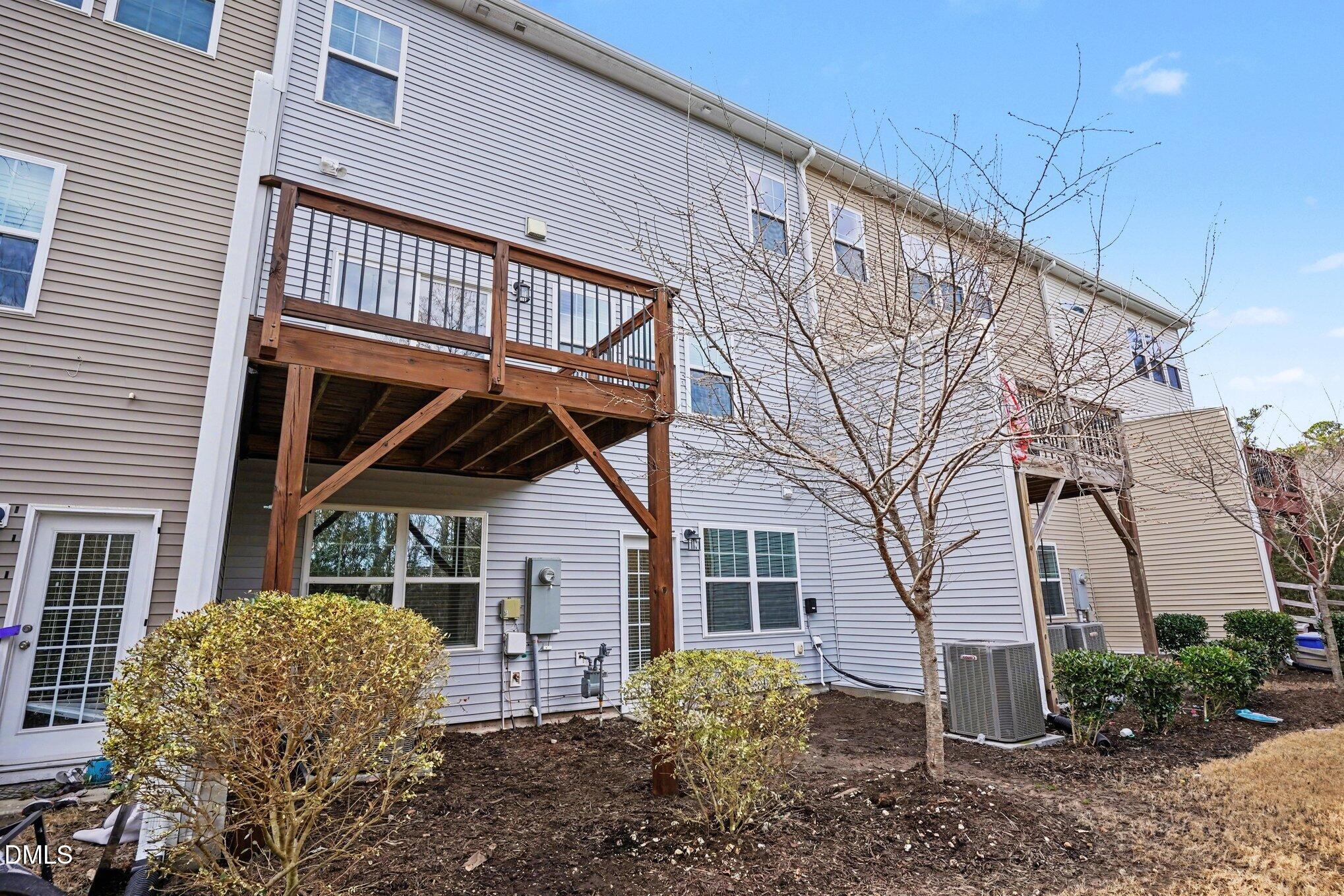 4245 Lofty Ridge Place Morrisville, NC 27560 - Photo 27 of 31 a view of a house with a yard