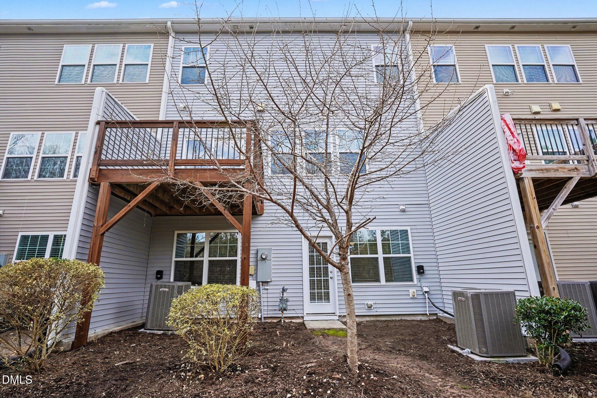 4245 Lofty Ridge Place Morrisville, NC 27560 - Photo 29 of 31 a front view of a house with garden