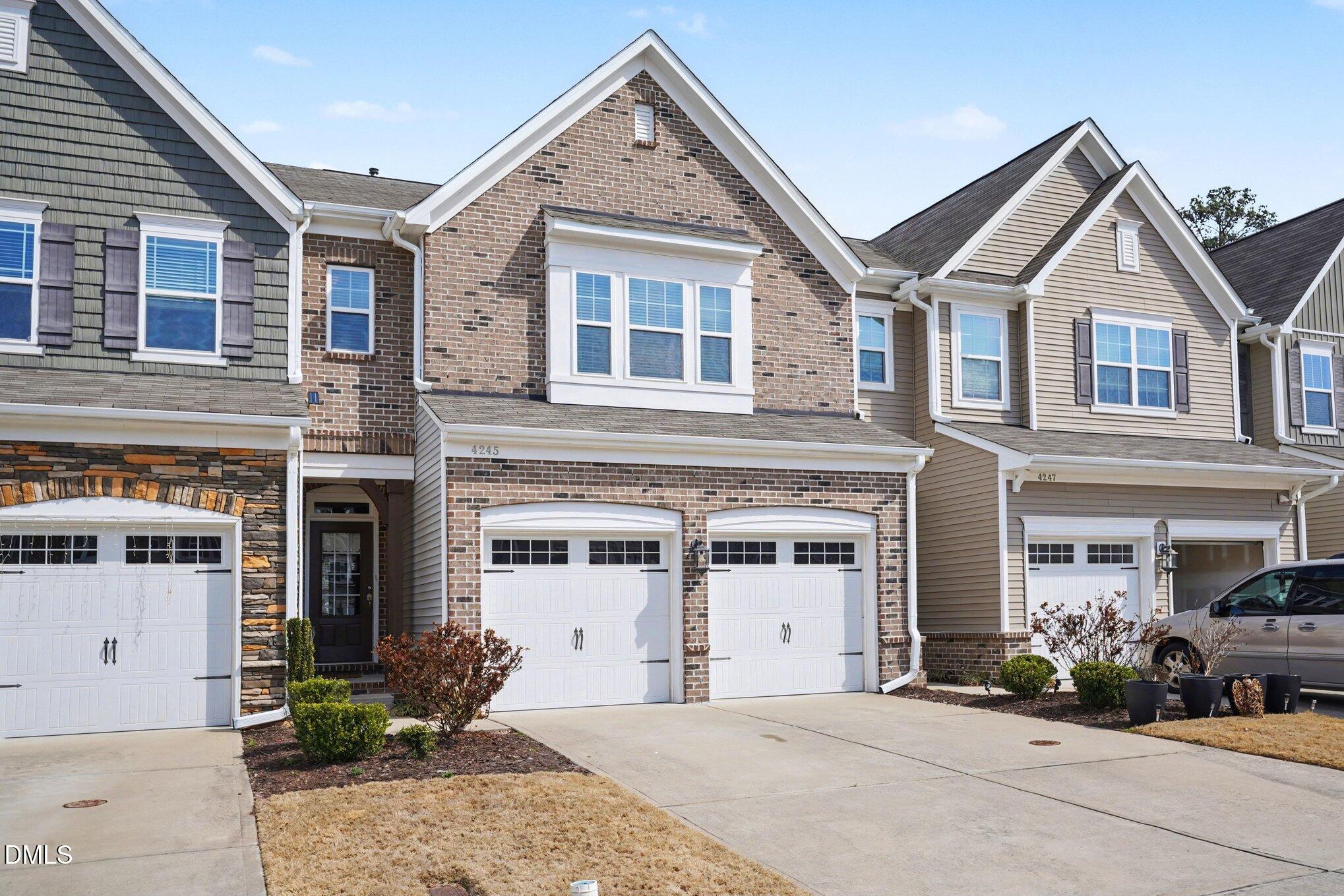 4245 Lofty Ridge Place Morrisville, NC 27560 - Photo 2 of 31 front view of a house with a yard