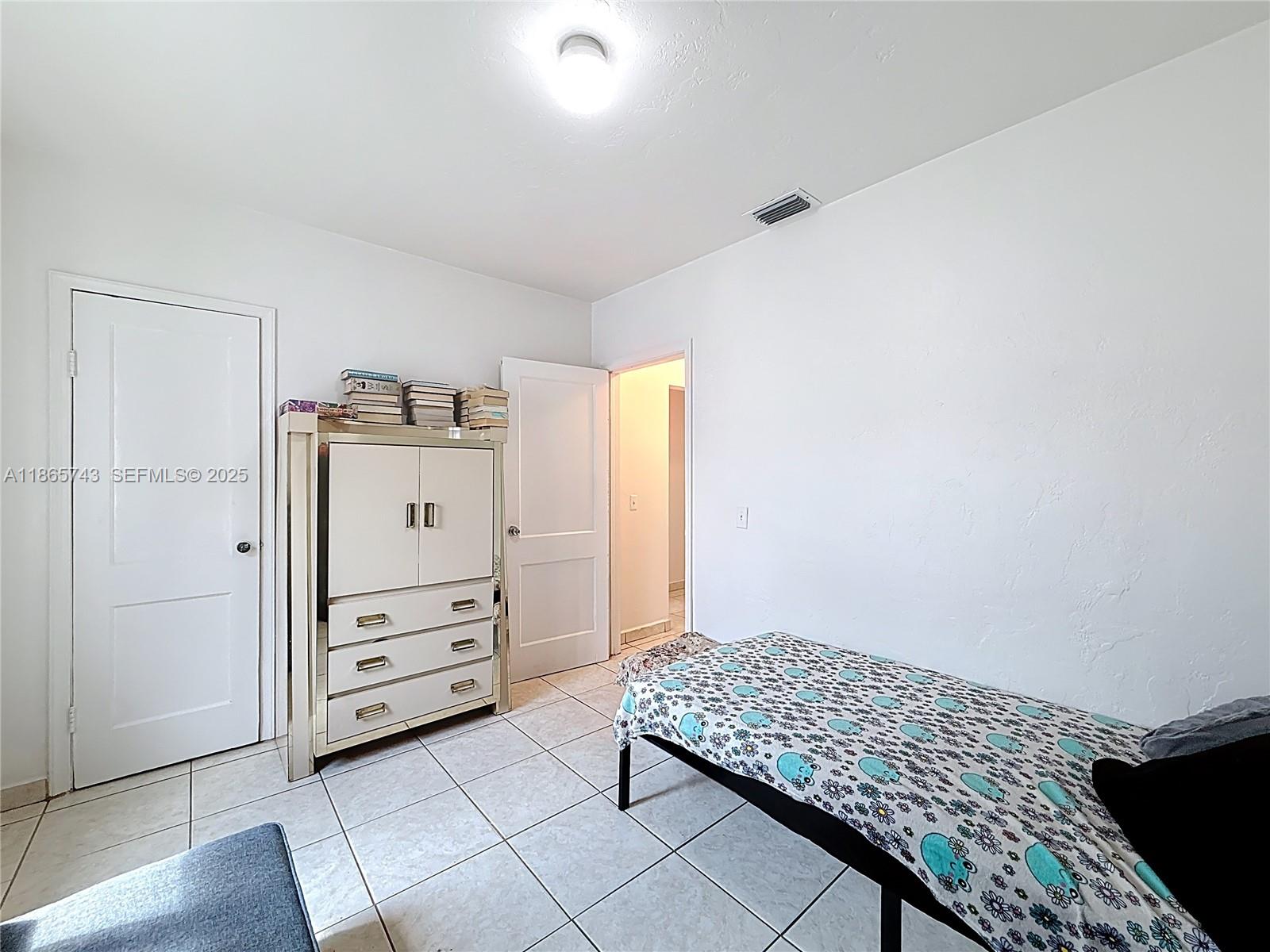 675 West 30th Street Hialeah, FL 33012 - Photo 13 of 17 a room with storage and utility
