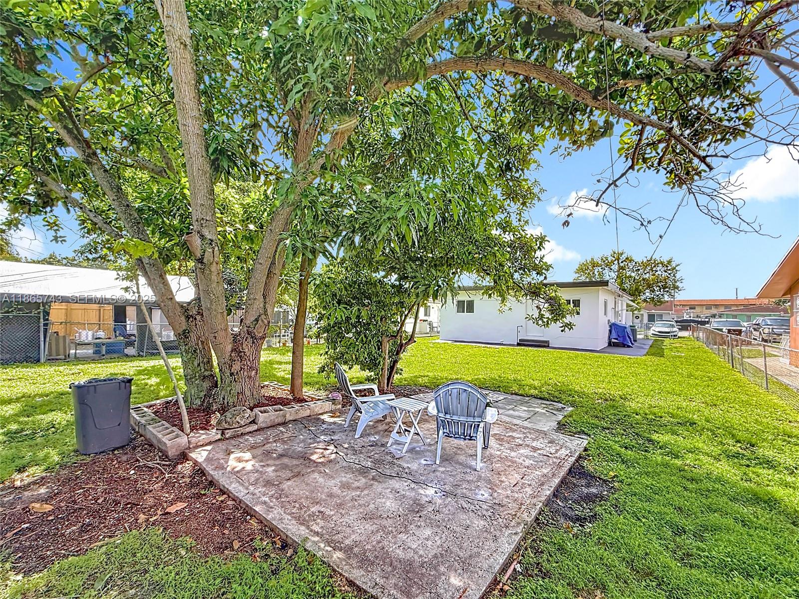 675 West 30th Street Hialeah, FL 33012 - Photo 15 of 17 a view of a house with garden