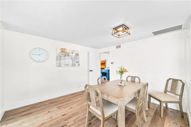 a bedroom with a large bed and a large window