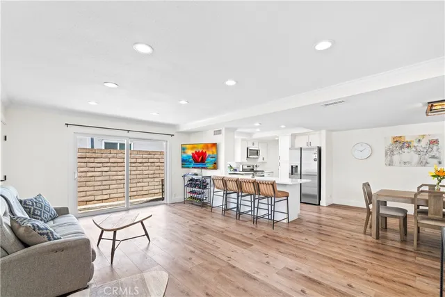 a bedroom with a bed and ceiling fan