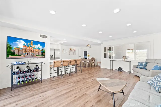 a view of hallway with wooden floor