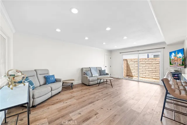 a bathroom with a toilet a sink a shower and a mirror