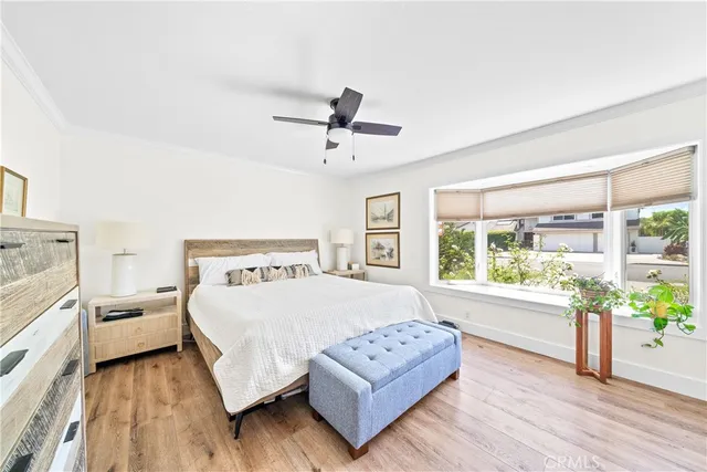 a bathroom with a toilet sink and shower