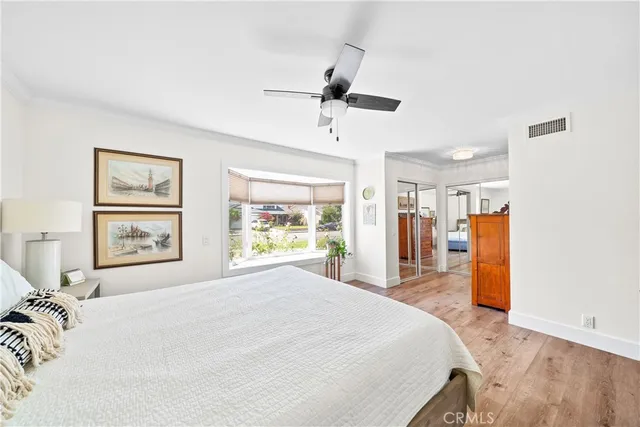 a bedroom with a bed and a view of bedroom