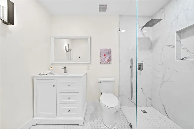 a bathroom with a sink double vanity and a bathtub