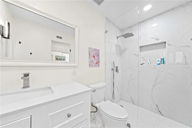 a work room with furniture and wooden floor