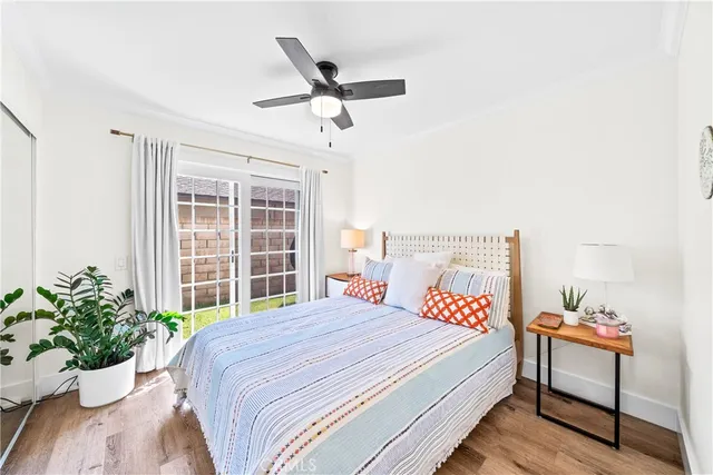 a front view of house with yard and car parked