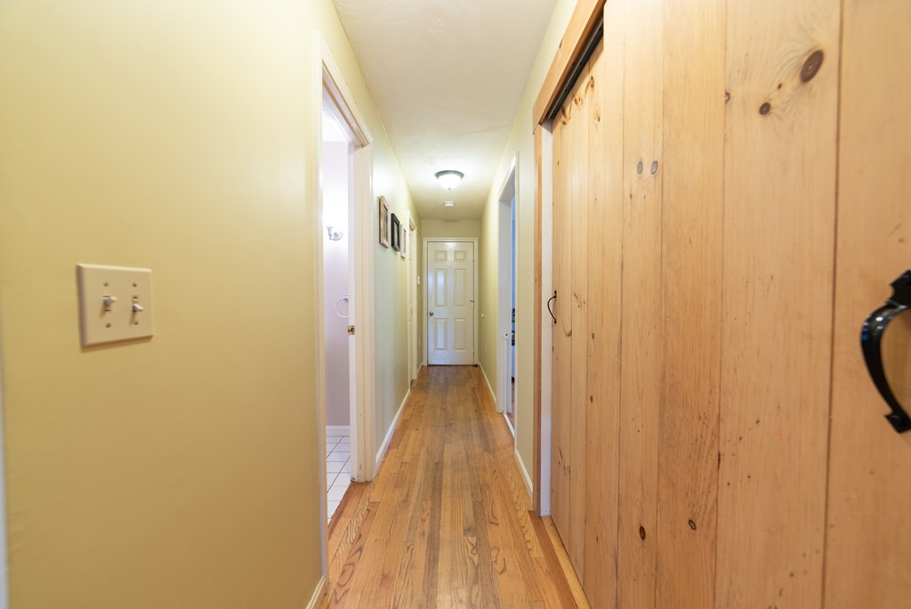 1565 West Street Wrentham, MA 02093 - Photo 15 of 30 a view of a bathroom from the hallway